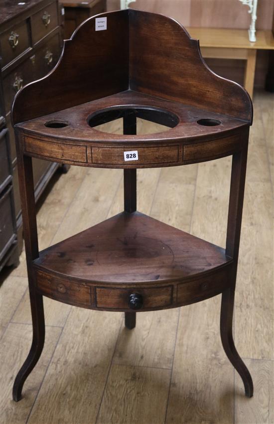 A Regency mahogany and ebony line inlaid bowfront corner washstand W.72cm